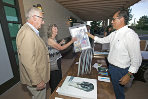 Steve and Barb Spanjer with artist Arturo Garcia