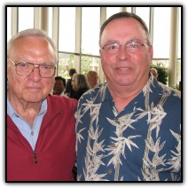 Larry Johnson, left, takes a moment for a photo with Chip Martin